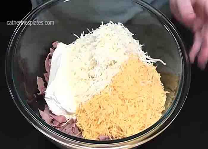 Combining the ingredients for the filling of Mississippi sins crescents