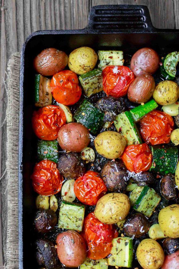 Italian oven roasted vegetables on a sheet pan with mushrooms, baby potatoes, tomatoes, zucchini and garlic