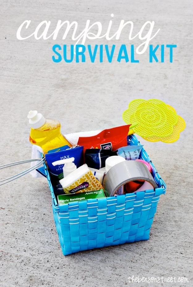 Blue plastic basket packed with dollar store camping supplies including tape, a fly swatter and toiletries