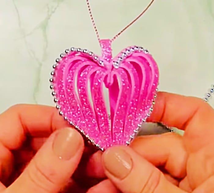 Learn to make a glitter foam DIY heart ornament with foam from Michaels Craft Store