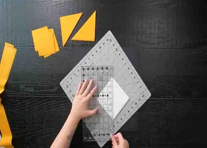 Making half-square triangles for the star quilter yardage pattern