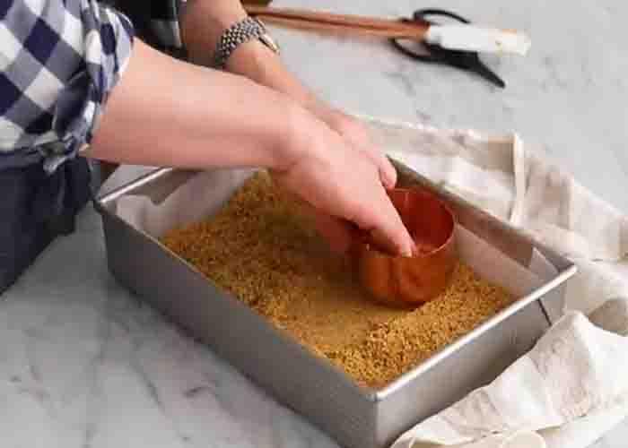 Making the crust for the magic cookie bars