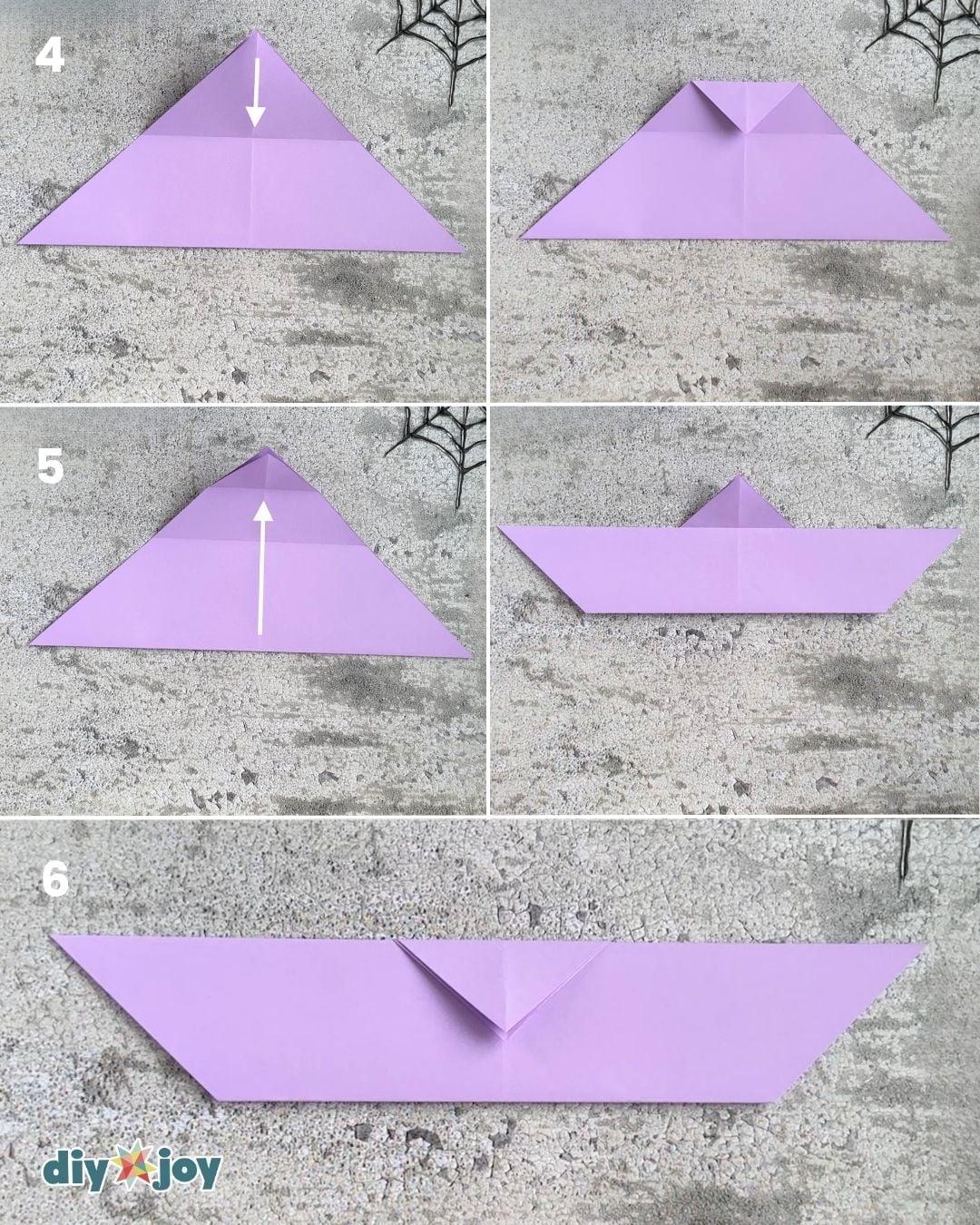 Paper bat origami step 2, folding the paper diagonally the other way, an easy no-scissors craft for kids.