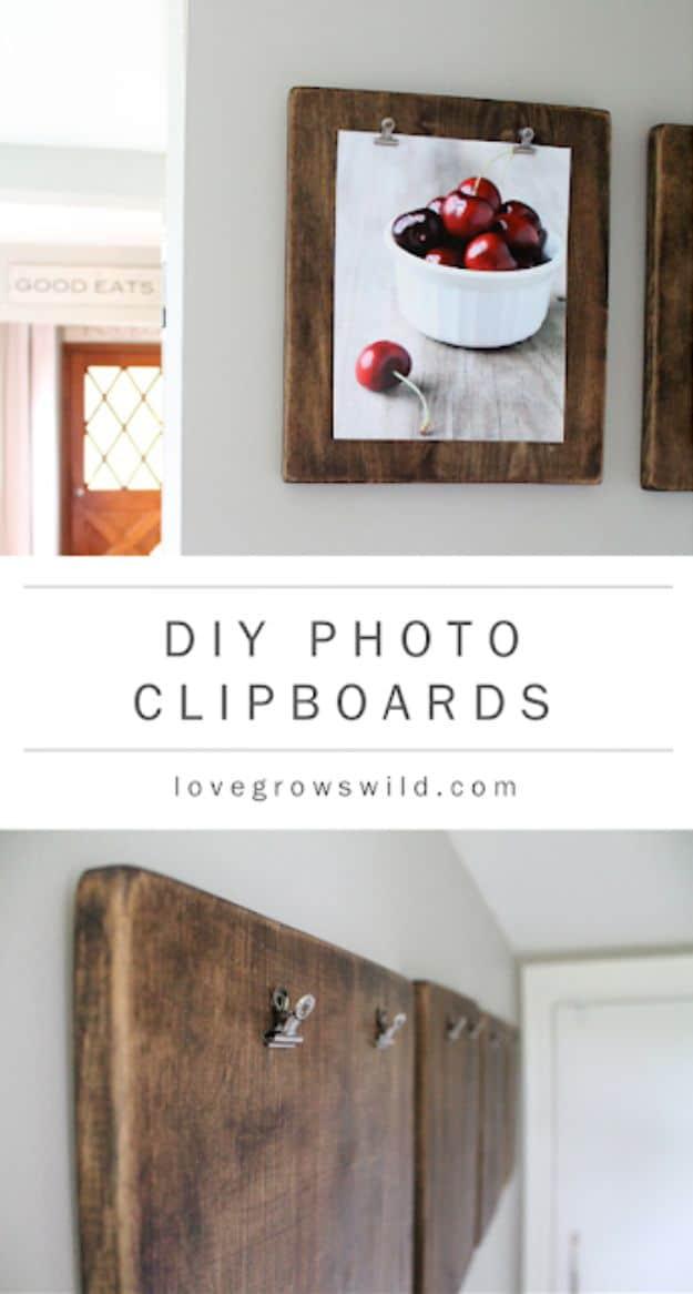 Stained wooden clipboards hung on a wall displaying food photographs, an easy beginner DIY home decor idea