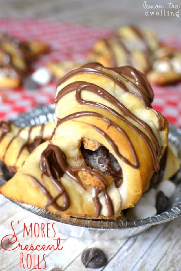 S'mores crescent rolls filled with Nutella, mini marshmallows and graham crackers, drizzled with chocolate