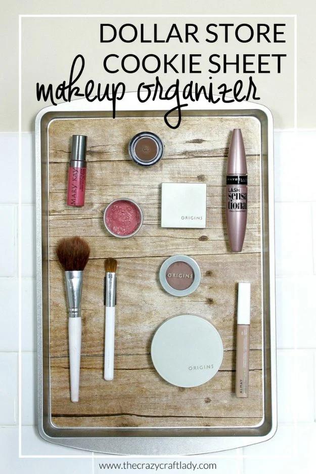 Dollar store cookie sheet makeup organizer graphic showing a wood print tray holding makeup on magnets