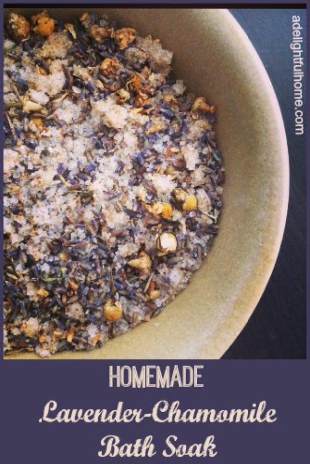 Bowl of homemade lavender chamomile bath soak with sea salts, dried lavender buds and chamomile flowers