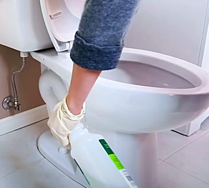Spray Entire Area With Enzyme Cleaner To Deep Clean A Toilet