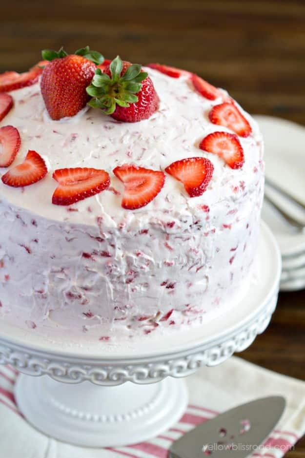 Fresh strawberry cake with three pound cake layers, whipped cream cheese frosting and real berries recipe for a celebration