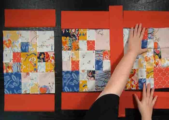 Adding the sashings and borders to the table runner quilt