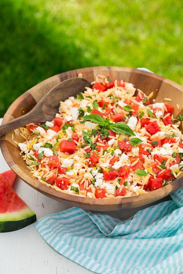 Watermelon feta orzo salad with orzo pasta, diced watermelon and crumbled feta tossed in a wooden bowl