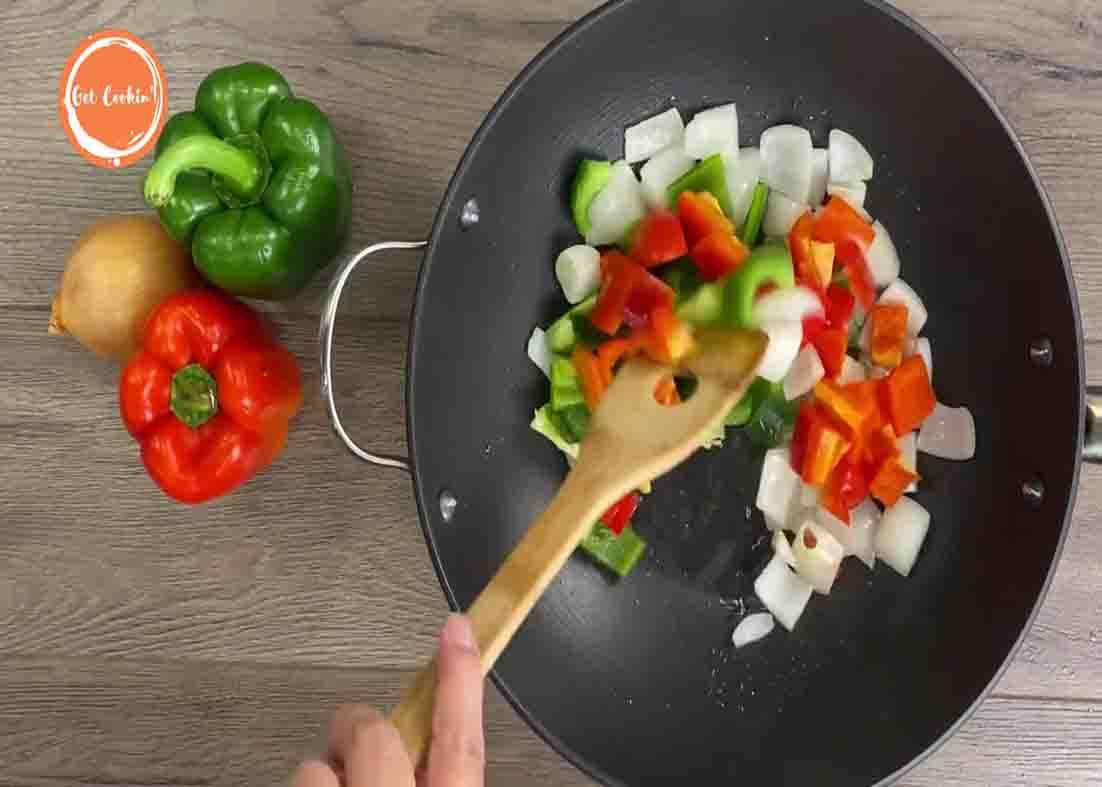 Sauteeing the veggies for the sweet and sour chicken