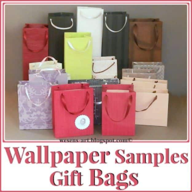 Wallpaper samples gift bags graphic, twenty folded paper gift bags in red purple and green with ribbon handles