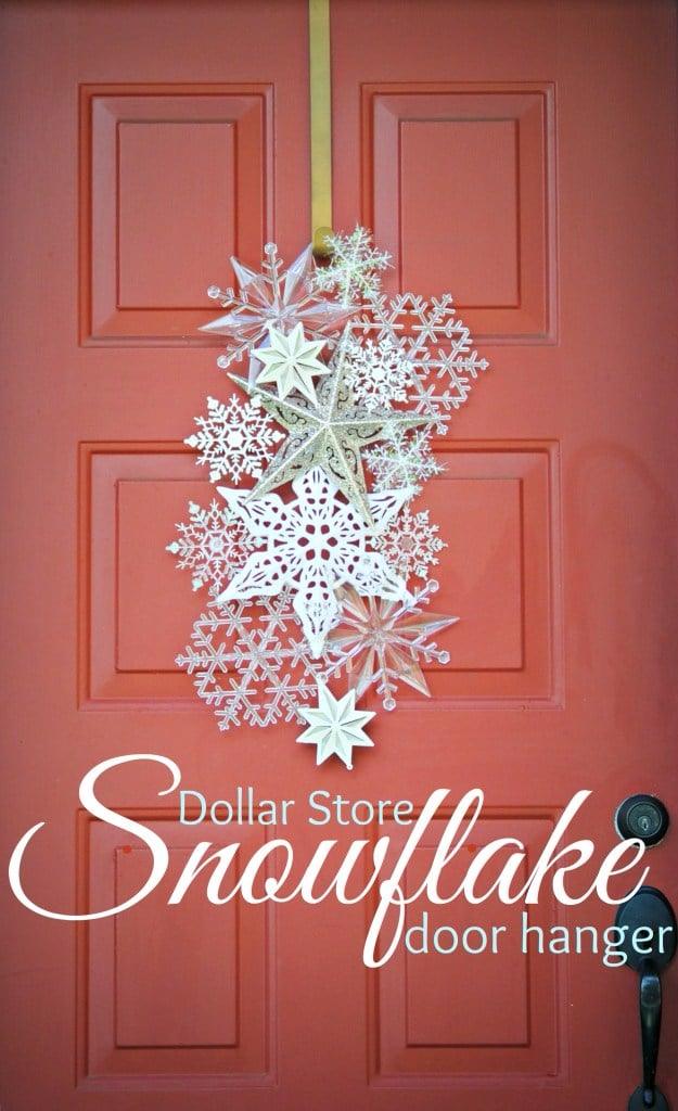 Cluster of white and clear glitter snowflakes and stars hot glued into a swag hanging on a red front door