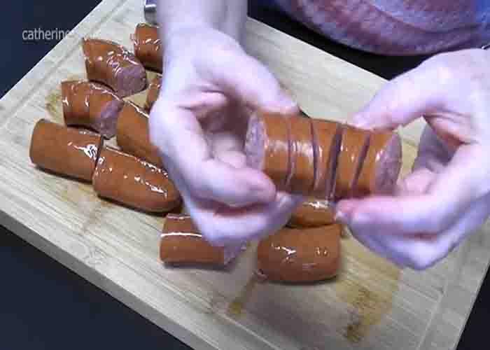 Hasselback cut the smoked sausages