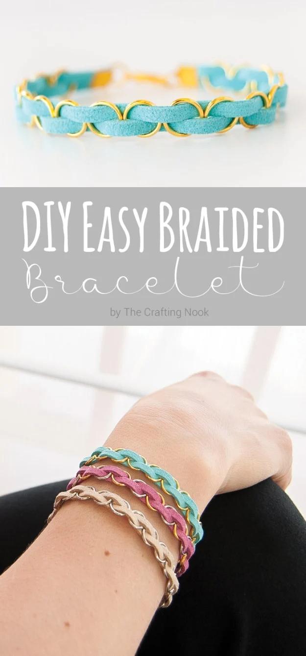 DIY easy braided bracelet, teal and yellow leather cord bracelets woven through gold jump rings stacked on a wrist