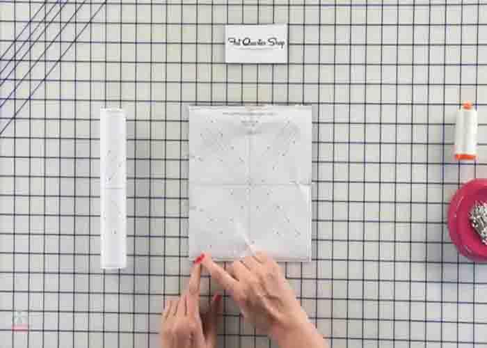 Making the small half-square triangles for the lady in lake quilt