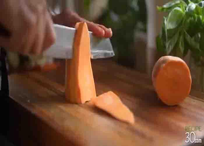 Chopping the veggies for the one-pan roasted vegetables recipe