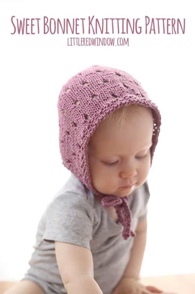 Dusty pink knitted baby bonnet with an eyelet band, tied under the chin, beneath typeset title lettering