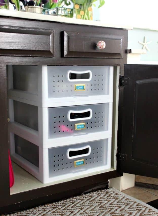 Plastic Bins Bathroom Organizer, budget friendly using stuff already sitting in a bin and a detail guests always ask about