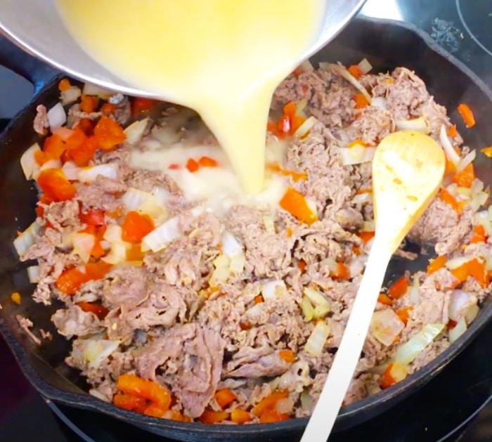 Use A Cast Iron Skillet To Cook A Philly Cheesesteak Casserole