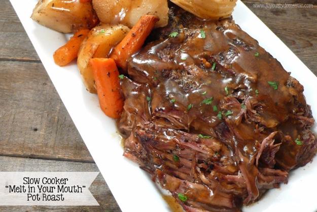 Glossy pot roast with carrots and potatoes on a white platter beside rich gravy, with project title text visible