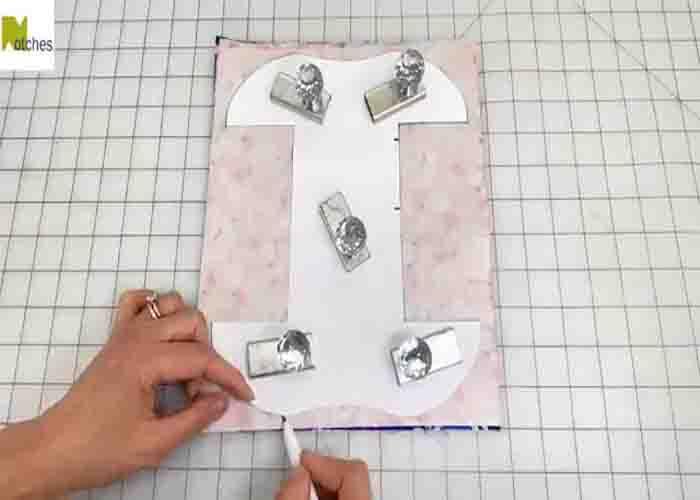 Tracing the template to make the DIY gift bag