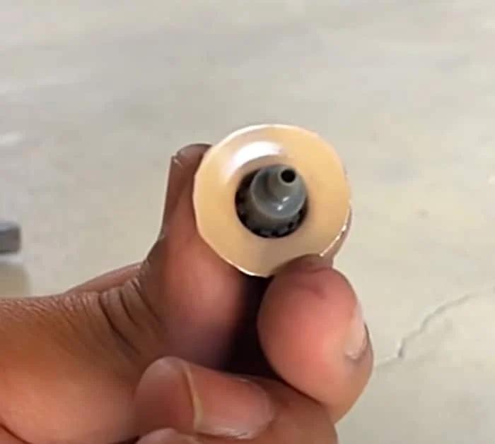 Make a spray painter out of a soda bottle