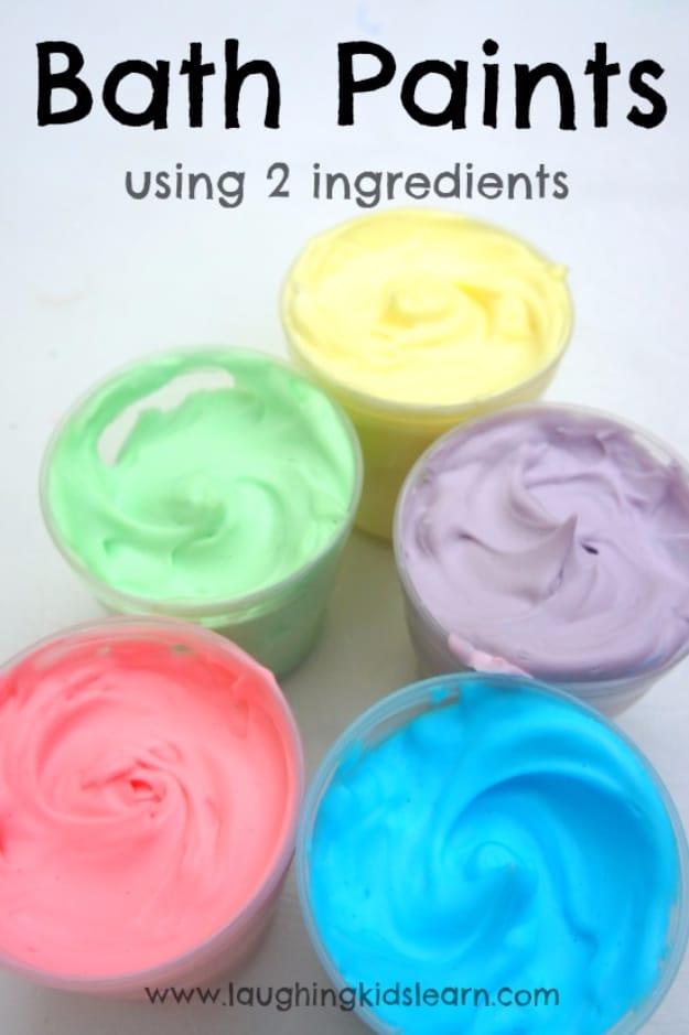 Bath paints using 2 ingredients, five cups of swirled yellow green purple pink and blue shaving foam bath paint