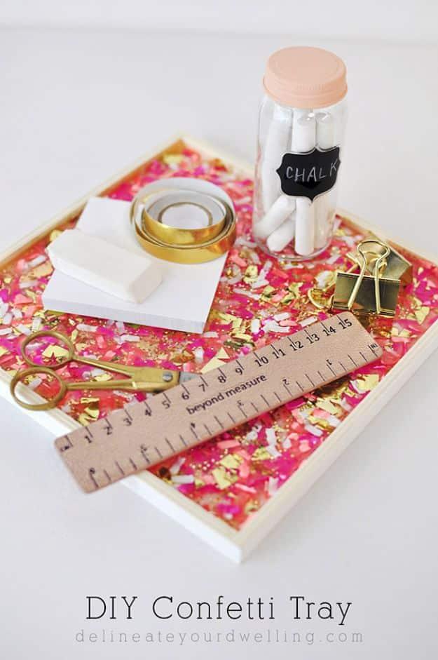 A pale wooden tray scattered with bright paper confetti and sealed under glassy resin, one of the most profitable crafts.