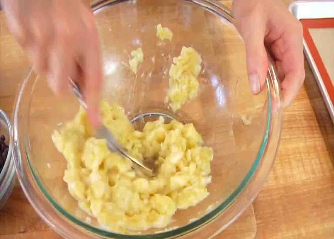 Mashing the banana for the banana oatmeal cookies