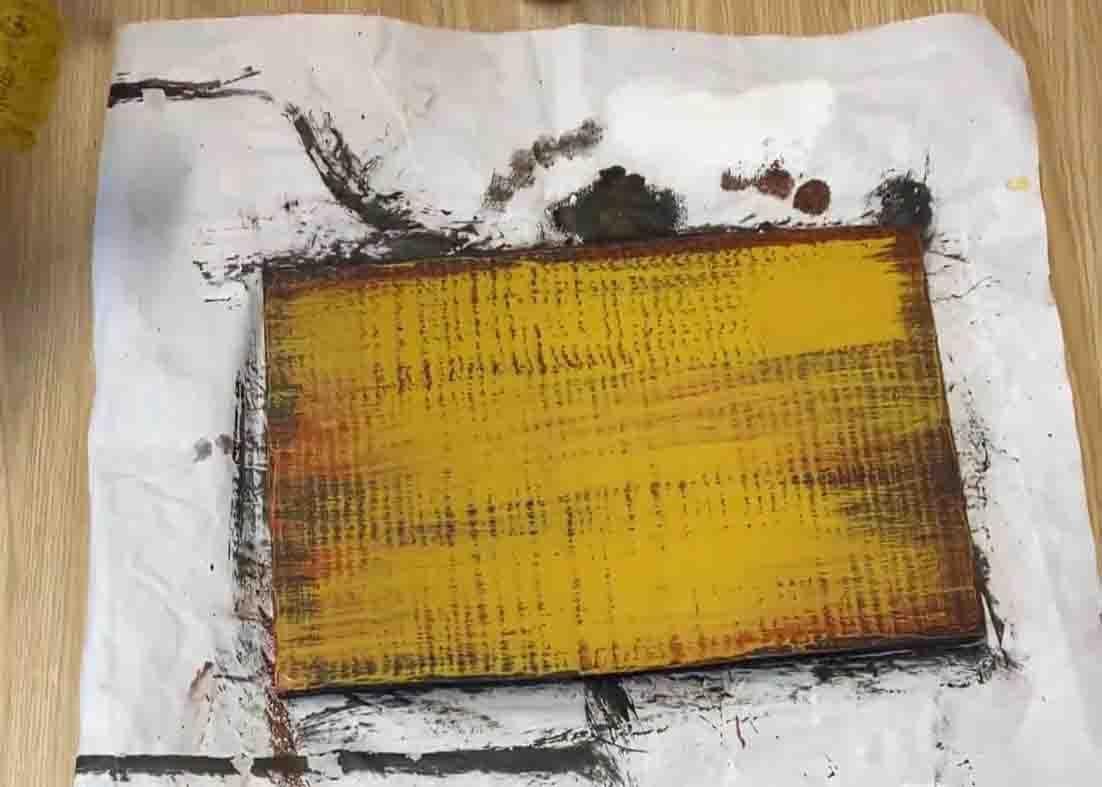 Painting the new wood with yellow color