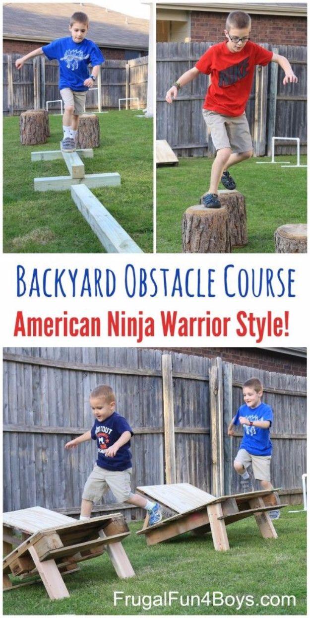 Backyard obstacle course with PVC hurdles, pallet stepping stones and a wooden balance beam set up on grass
