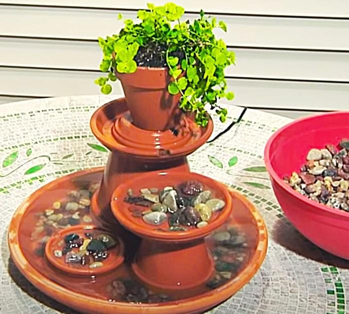 Terracotta pot DIY fountain with decorative rocks