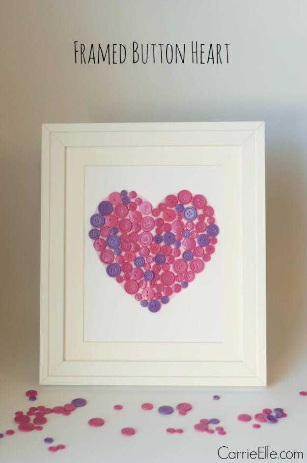 Framed heart made from pink white and red buttons on a linen background, an easy DIY Valentine craft