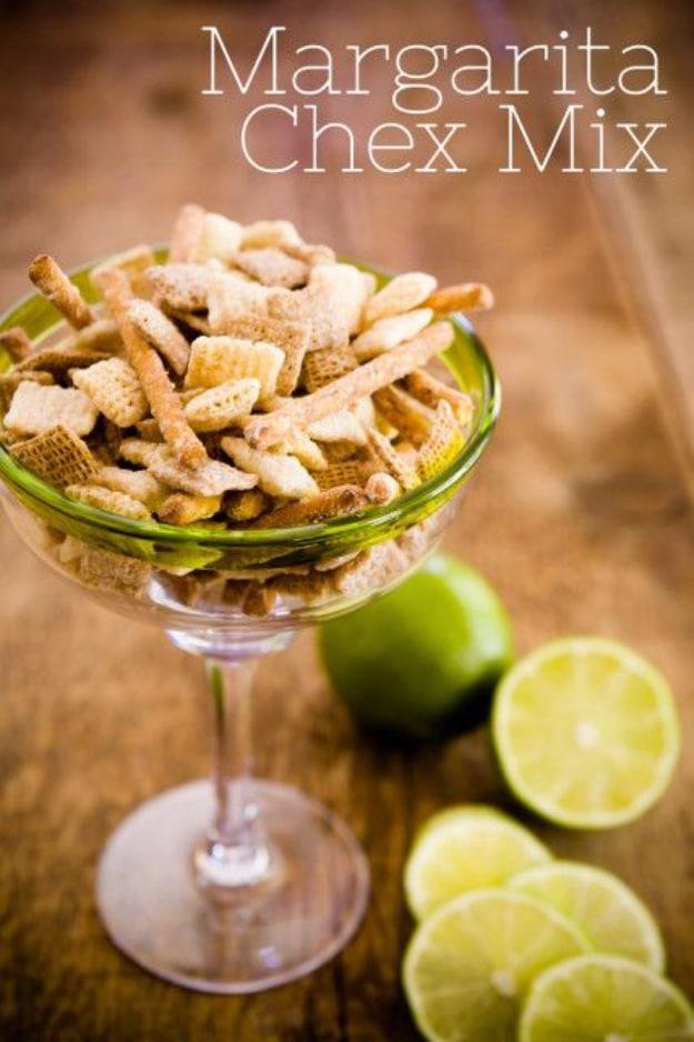 Homemade margarita chex mix with rice and wheat chex and pretzel sticks in a powdered sugar lime coating