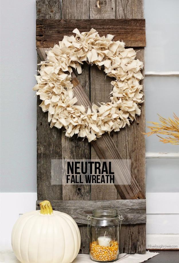 Neutral fall wreath in cream and greige built from mixed textures, a quiet autumn wreath for any door