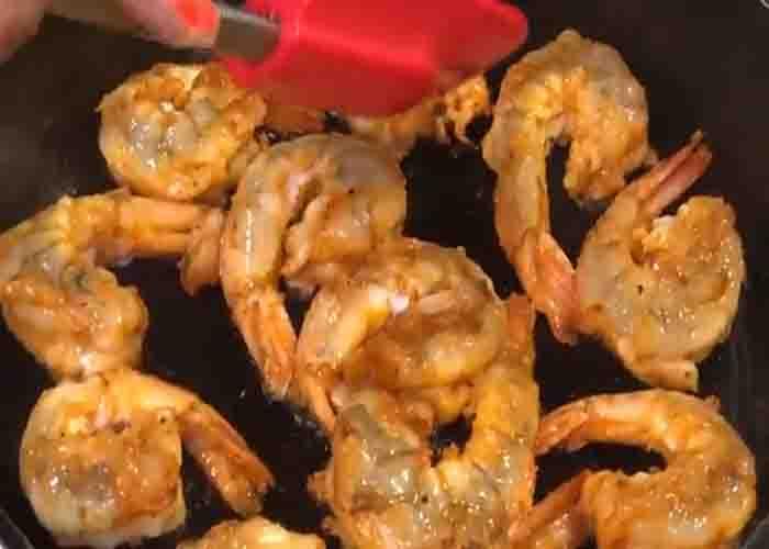 Frying the shrimp for the cajun pasta recipe