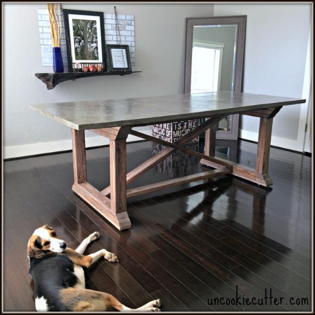 DIY Concrete Dining Table, a reclaimed wood design, quick to set up on a rainy afternoon and a detail guests always ask about