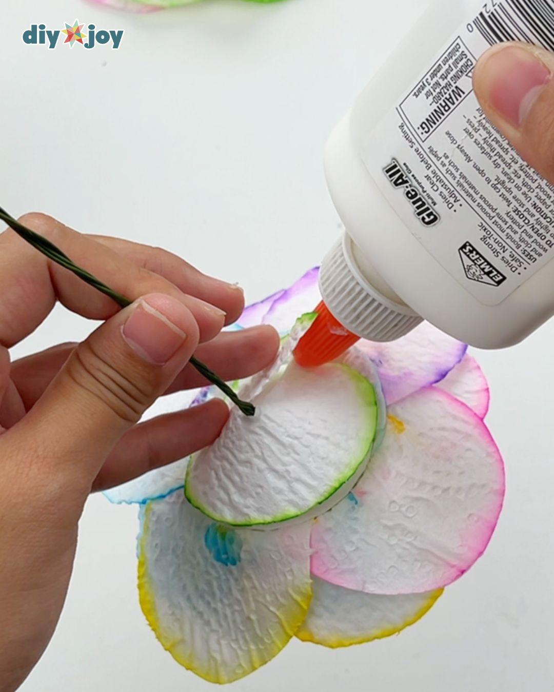 Homemade Toilet Paper Flowers — covering the cone shape