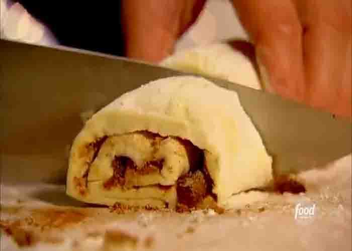 Slicing the sticky bun roll