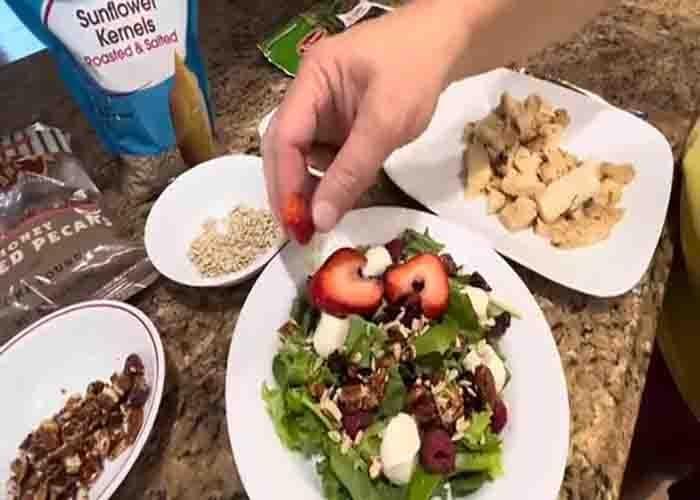 Assembling the summer berry salad