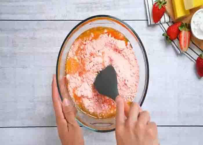 Mixing all the ingredients for the strawberry brownies