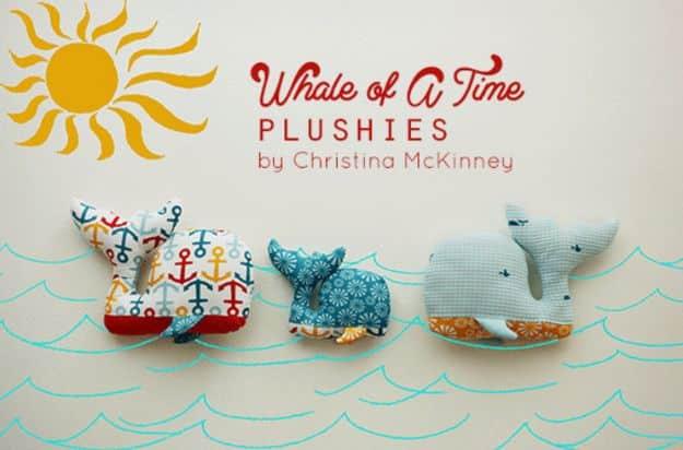 Whale of a Time plushies graphic, three stuffed whales in anchor and floral prints above drawn blue waves