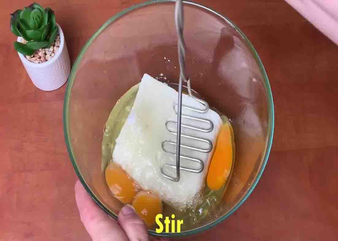 Combining the ingredients of cottage cheese casserole