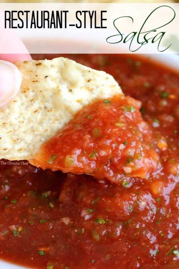Restaurant style salsa blended with canned tomatoes, jalapeno and cilantro in a bowl with tortilla chips