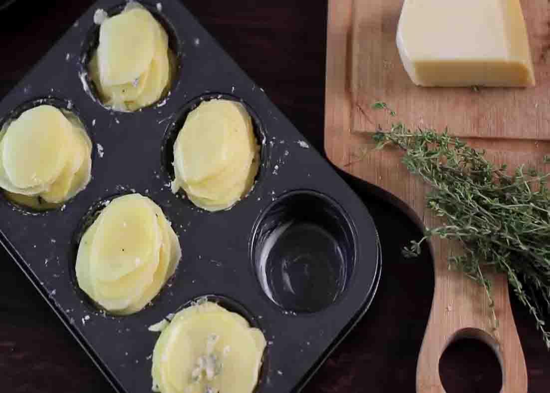Layering the potato slices into stacks