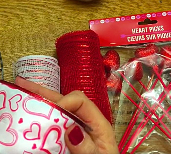 Make a cute cheap DIY Mesh Wreath with materials from Dollar Tree