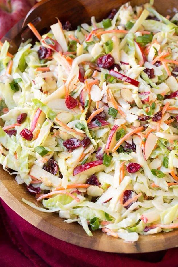 Apple cranberry and almond coleslaw tossed with shredded cabbage, carrots and a creamy yogurt dressing