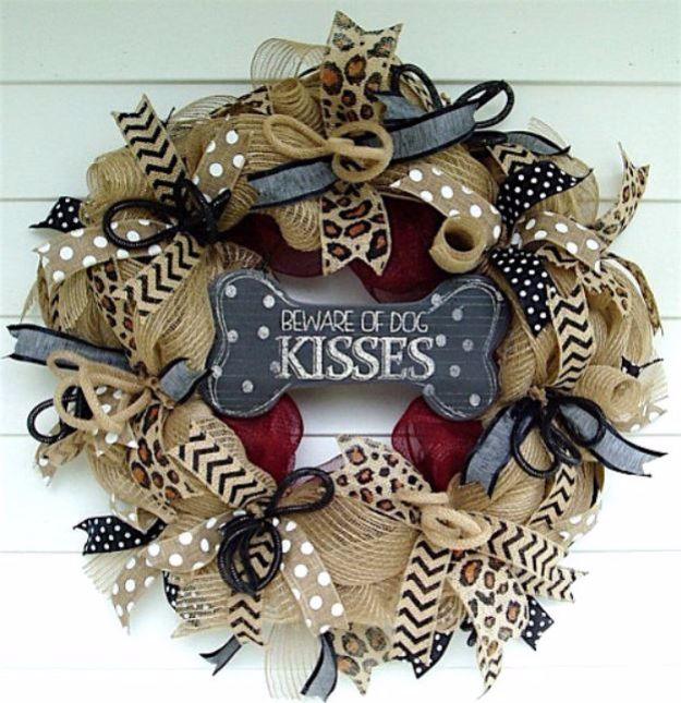Burlap deco mesh wreath in tan and black with leopard and polka dot ribbon and a grey Beware Of Dog Kisses sign